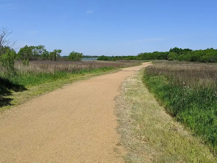 A trail along Lewisville Lake in Ridgepointe Park, The Colony